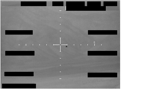 FBI sensor frame A1 - dark spherical object centred in targeting reticle, redaction bars covering operator info and timestamps